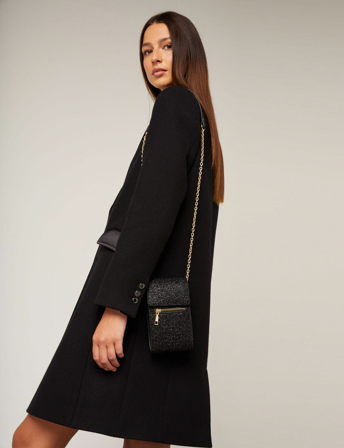 Bolso teléfono lentejuelas negro